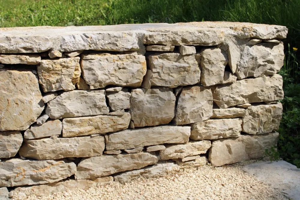 Réparation mur en pierre à Saint-Paul-les-Fonts